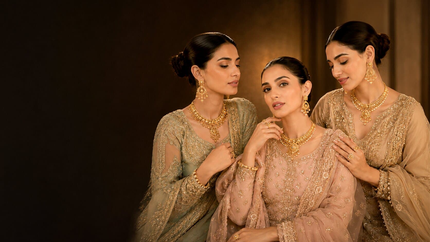 Three women presenting distinct Zia Jewellers gold collections